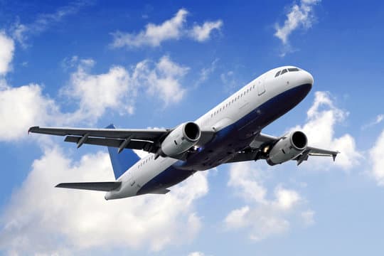 Airplane flying in sky